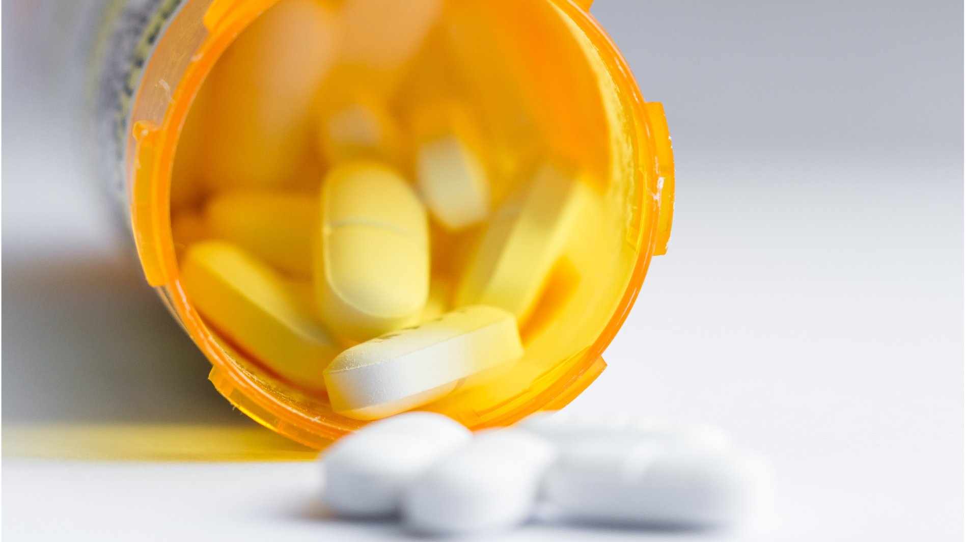 a bottle of pills indicating non-opioid pain relief solutions